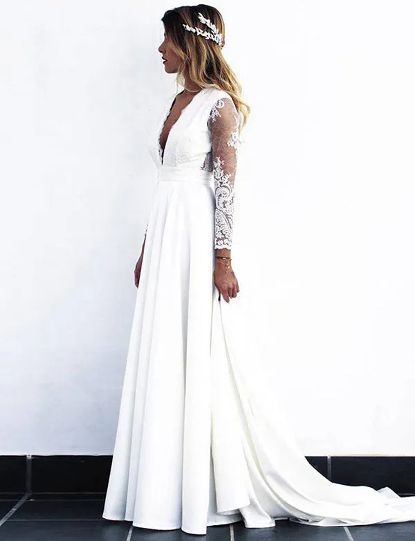 Robe de mariée longue en dentelle blanche à manches longues et col en V