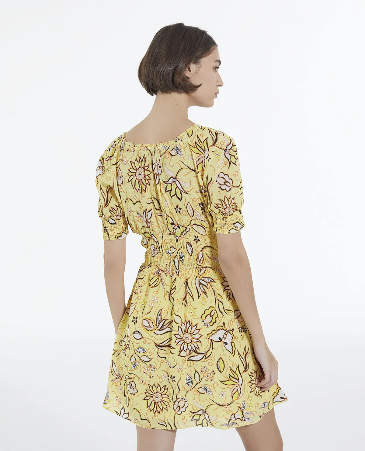 Robe jaune à fleurs courte manches bouffantes