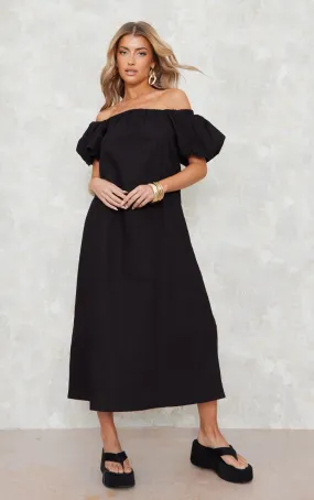 Robe mi-longue noire tissée à col bardot et manches bouffantes