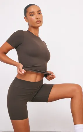 Top de sport long en Sculpt espresso à manches courtes